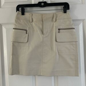 Cream color, cargo mini skirt.  Beautiful material, classic style.